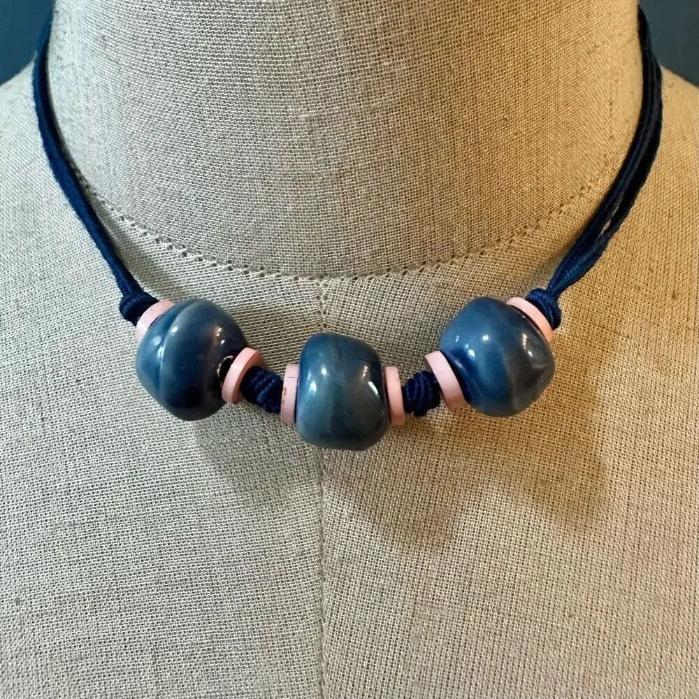 Blue and pink beaded choker necklace on cord
